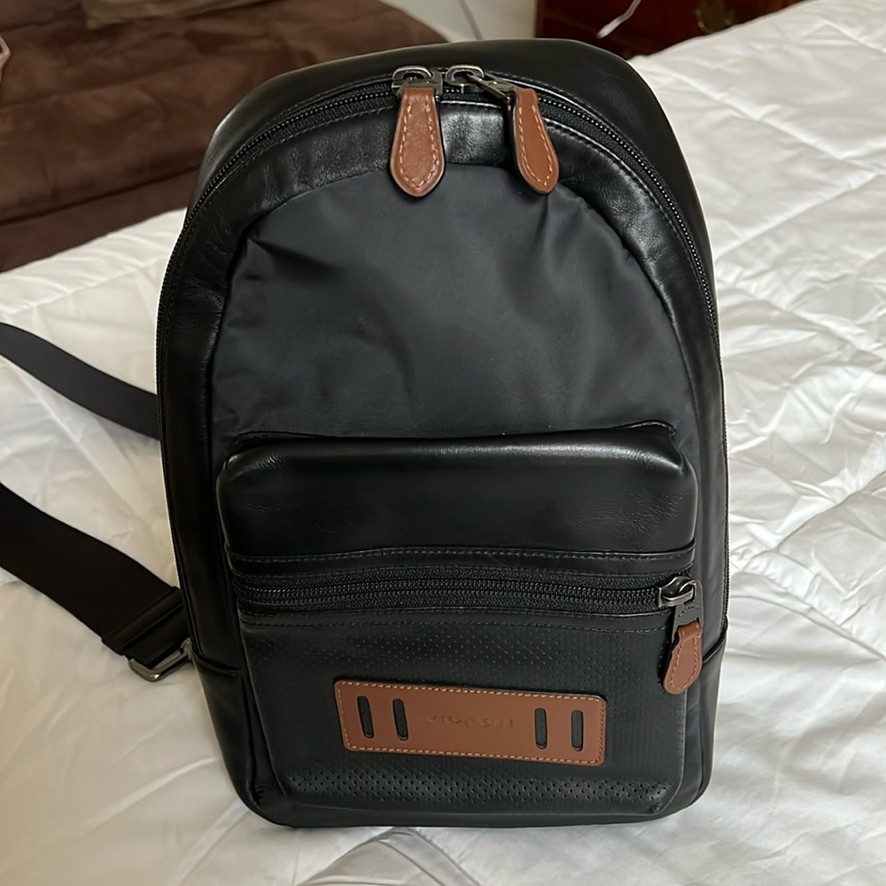 Authentic Coach sling bag.